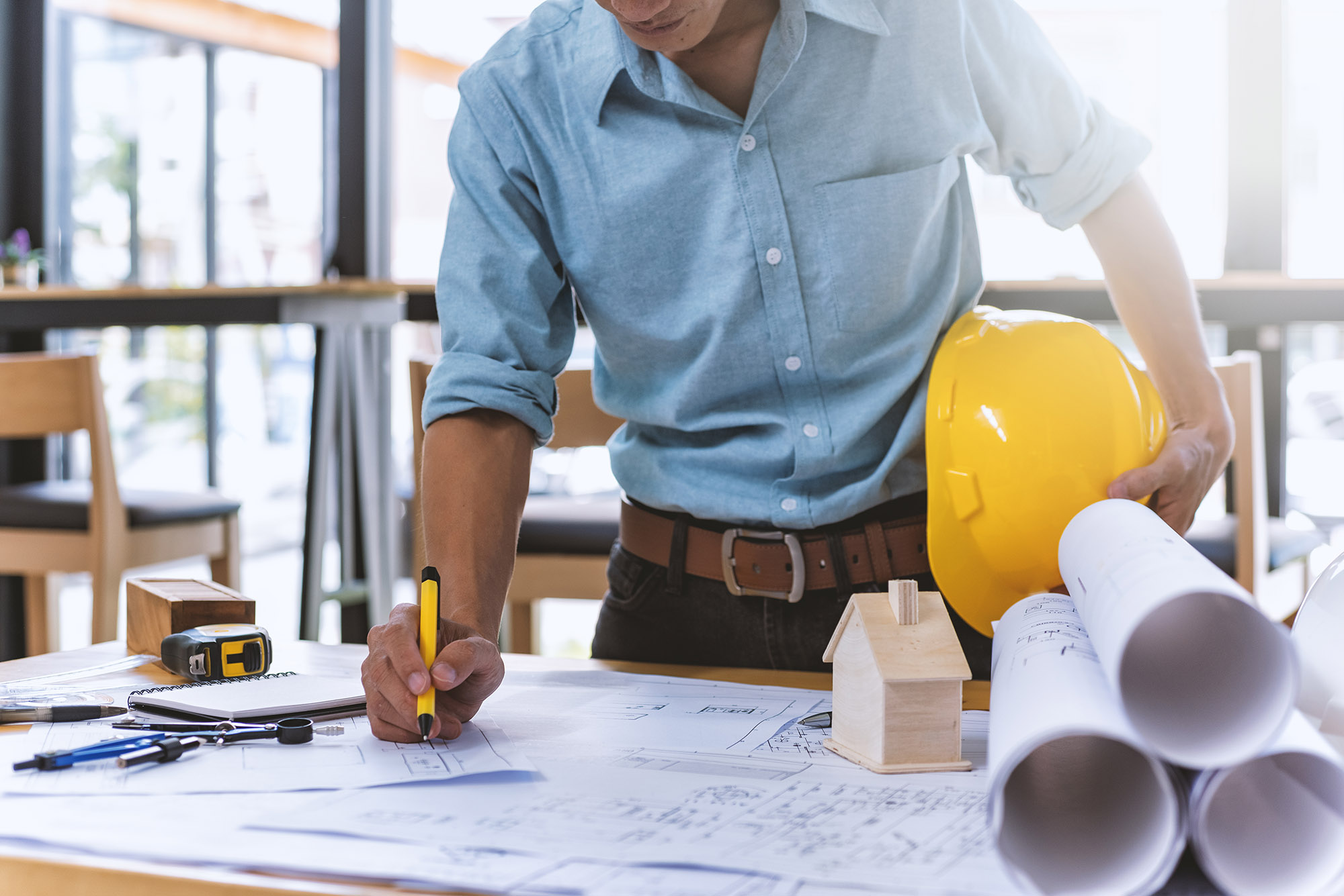 Remodeling project planning with construction drawings
