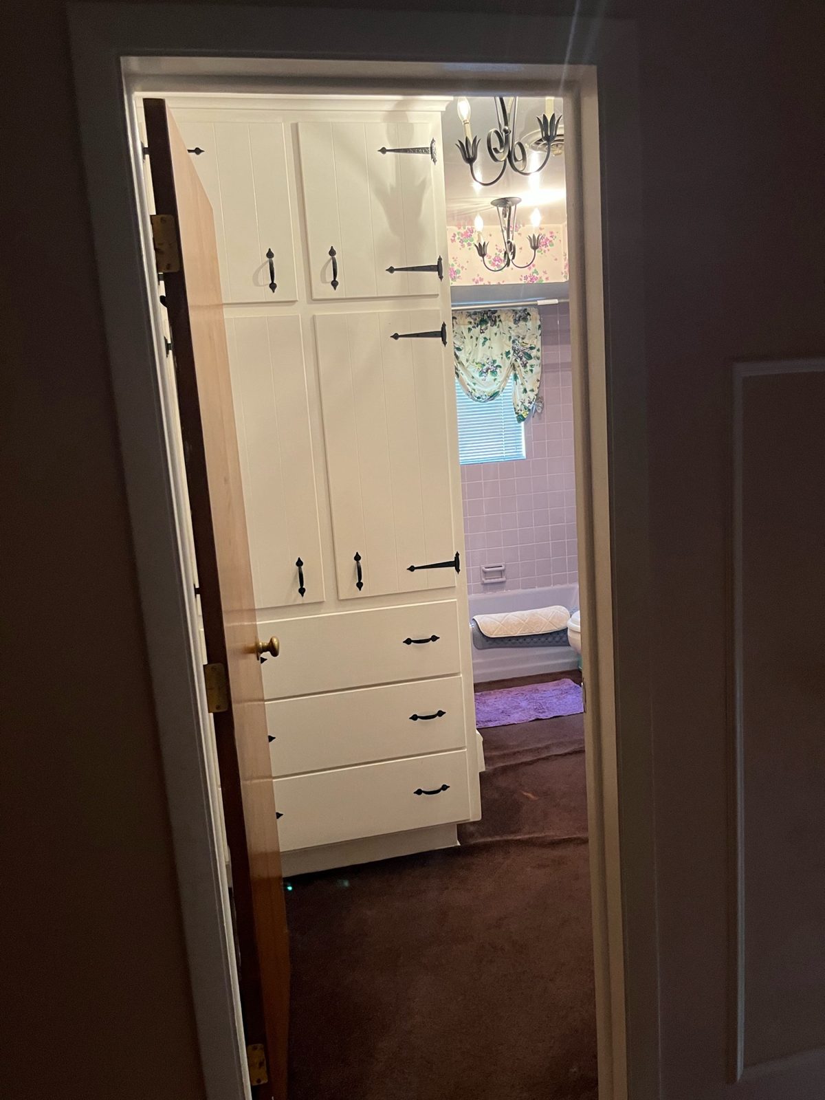 Measuring the bathroom during the in-home visit