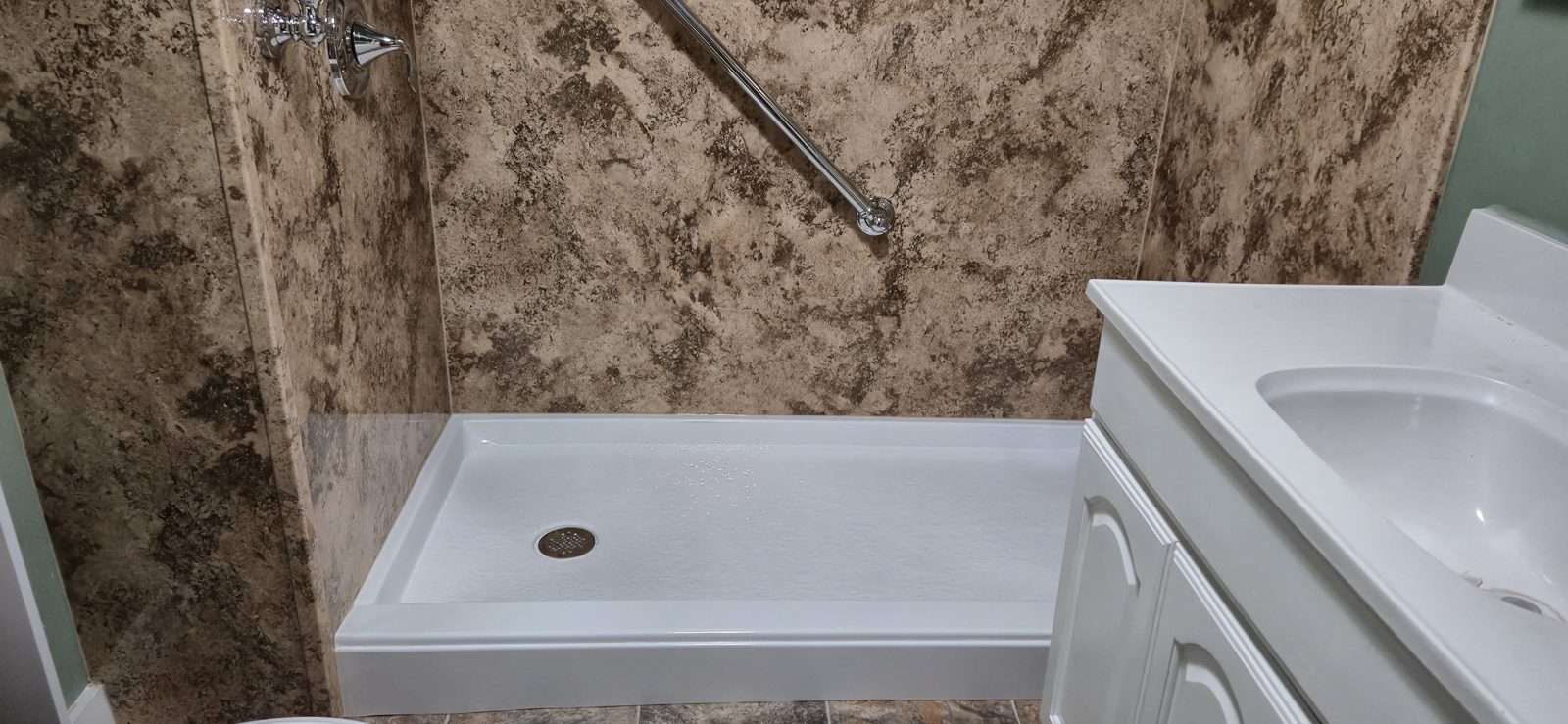Grab bar and low-profile shower pan detail